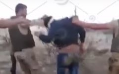 A screen capture from a clip showing Egyptian soldiers leading a blindfolded unarmed man. The man is seen shot to death from close range later in the clip, posted by an Egyptian opposition TV channel on Youtube on Thursday, April 20, 2017. (Screen capture YouTube)