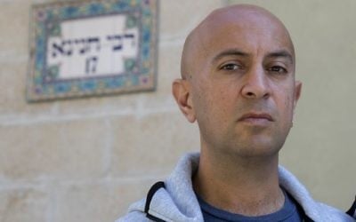Avi Issacharoff, one of the co-authors of the Israeli TV drama "Fauda", or chaos in Arabic, poses for a photograph on March 8, 2017 in Tel Aviv. (AFP/Jack Guez) 