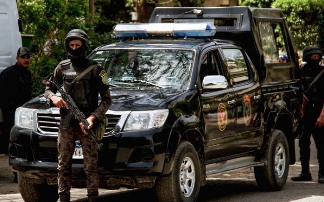 Illustrative: Egyptian security forces stand guard around the Coptic Catholic College of Theology and Humanities in the southern Cairo suburb of Maadi on April 29, 2017, during Pope Francis's visit to the country. (AFP/Aly Fahim) Illustrative: Egyptian security forces stand guard around the Coptic Catholic College of Theology and Humanities in the southern Cairo suburb of Maadi on April 29, 2017, during Pope Francis's visit to the country. (AFP/Aly Fahim)