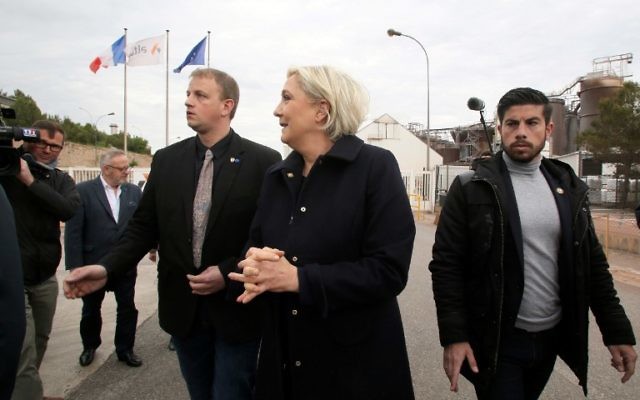 French presidential election candidate for the far-right Front National (FN) party Marine Le Pen (L) arrives at the Alteo aluminium plant in Gardanne, southern France, on April 30, 2017. (AFP / STR)