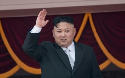 This file photo taken on April 15, 2017 shows North Korean leader Kim Jong-Un waving from a balcony of the Grand People's Study house following a military parade marking the 105th anniversary of the birth of late North Korean leader Kim Il-Sung, in Pyongyang. (AFP/Ed Jones)