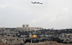 Israeli C-130 Hercules transport planes fly over Jerusalem during celebrations marking Israel's 69th Independence Day on May 2, 2017. (AFP Photo/Thomas Coex)