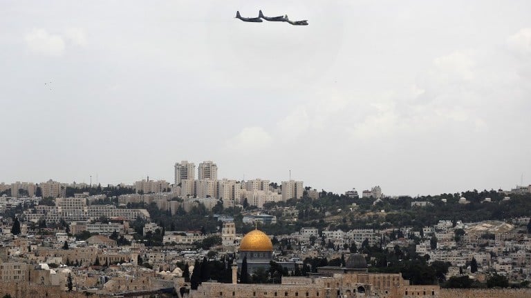 Israeli C-130 transport planes flt over Jerusalem during celebrations marking Israel's 69th Independence Day on May 2, 2017. (AFP Photo/Thomas Coex) Israeli C-130 transport planes flt over Jerusalem during celebrations marking Israel's 69th Independence Day on May 2, 2017. (AFP Photo/Thomas Coex)