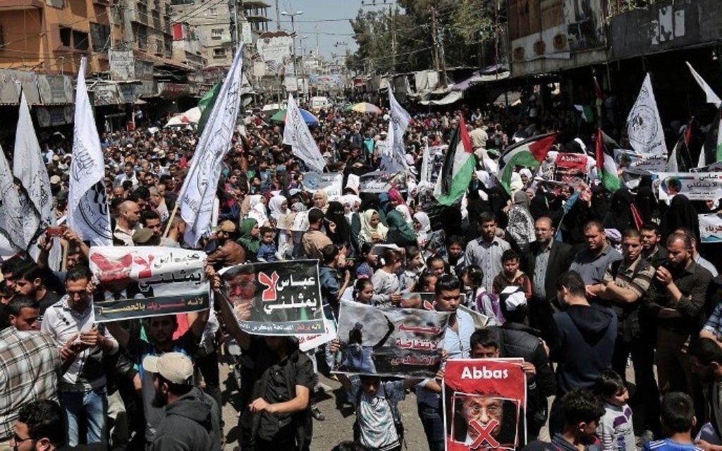 Supporters of Hamas, Islamic Jihad and the al-Ahrar movement protest against Palestinian Authority President Mahmoud Abbas in the southern Gaza Strip town of Rafah on May 2, 2017. (AFP/Said Khatib) Supporters of Hamas, Islamic Jihad and the al-Ahrar movement protest against Palestinian Authority President Mahmoud Abbas in the southern Gaza Strip town of Rafah on May 2, 2017. (AFP/Said Khatib)