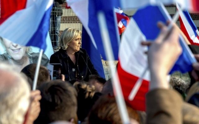 French presidential election candidate for the far-right Front National (FN) party Marine Le Pen speaks during a campaign meeting in Ennemain, northern France, on May 4, 2017. (AFP Photo/Philippe Huguen) French presidential election candidate for the far-right Front National (FN) party Marine Le Pen speaks during a campaign meeting in Ennemain, northern France, on May 4, 2017. (AFP Photo/Philippe Huguen)