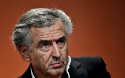 French philosopher Bernard-Henri Levy looks on during a forum against abstention in Paris, on May 5, 2017, two days ahead of the second round of the French presidential elections. (AFP PHOTO / PHILIPPE LOPEZ)