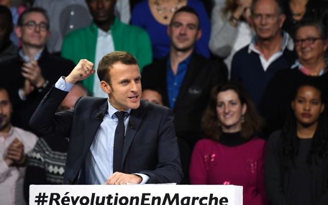 French presidential candidate Emmanuel Macron of the "En March !" movement speaking during a campaign rally in Paris, December 10, 2016. (AFP PHOTO / Eric FEFERBERG)