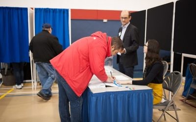 French citizens vote at Collège Stanislas in Montreal, Saturday, May 6. In France, Emmanuel Macron and Marine Le Pen will face each other May 7 for the 2017 French presidential election. (AFP/Catherine Legault)