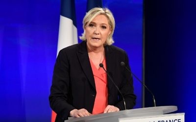 French presidential election candidate for the far-right Front National (FN) party Marine Le Pen delivers a speech in Paris, on May 7, 2017, after the second round of the French presidential election. (AFP/Bertrand Guay) French presidential election candidate for the far-right Front National (FN) party Marine Le Pen delivers a speech in Paris, on May 7, 2017, after the second round of the French presidential election. (AFP/Bertrand Guay)