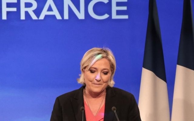 French presidential election candidate for the far-right Front National (FN) party Marine Le Pen delivers a speech in Paris, on May 7, 2017, after losing the second round of the French presidential election. (AFP PHOTO / joel SAGET) French presidential election candidate for the far-right Front National (FN) party Marine Le Pen delivers a speech in Paris, on May 7, 2017, after losing the second round of the French presidential election. (AFP PHOTO / joel SAGET)
