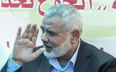 Newly elected Hamas chief, Ismail Haniyeh, gestures as he meets with protesters at a sit-in supporting Palestinian hunger-striking prisoners held in Israeli jails, in Gaza City, May 8, 2017 (AFP/Mahmud Hams)