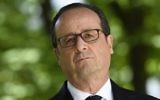 French President Francois Hollande seen at a ceremony marking the anniversary of the abolition of slavery on May 10, 2017, at the Jardins du Luxembourg. (AFP Photo/Pool and AFP Photo/Eric Feferberg)