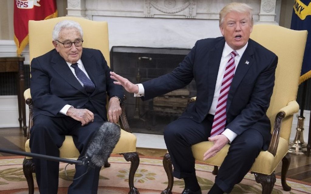 US President Donald Trump speaks during a meeting with former US secretary of state Henry Kissinger in the Oval Office of the White House on May 10, 2017. (AFP Photo/Jim Watson)