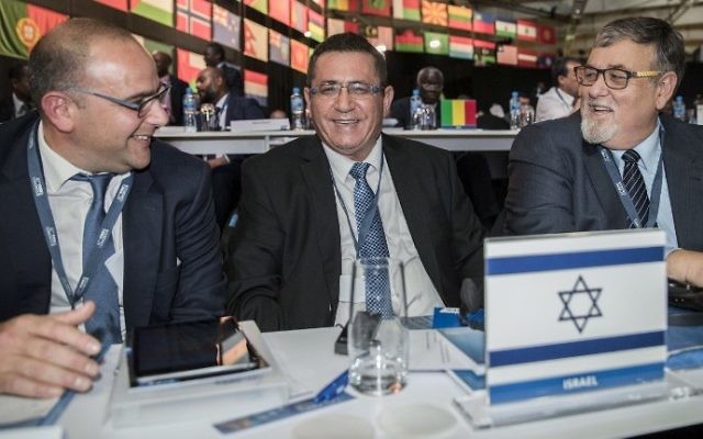 President of the Israeli Football Association Ofer Eini and ISA CEO Rotem Kamer (L) attend the 67th FIFA Congress in the Bahraini capital Manama on May 11, 2017. (AFP Photo/Jack Guez) President of the Israeli Football Association Ofer Eini and ISA CEO Rotem Kamer (L) attend the 67th FIFA Congress in the Bahraini capital Manama on May 11, 2017. (AFP Photo/Jack Guez)