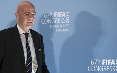 FIFA President Gianni Infantino arrives to a press conference at the 67th FIFA Congress in the Bahraini capital Manama on May 11, 2017. (AFP Photo/Jack Guez) FIFA President Gianni Infantino arrives to a press conference at the 67th FIFA Congress in the Bahraini capital Manama on May 11, 2017. (AFP Photo/Jack Guez)
