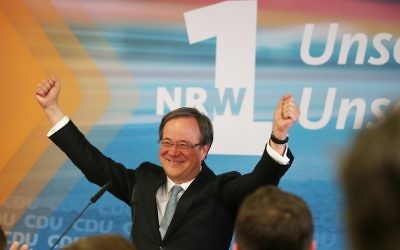 Armin Laschet, top candidate of the conservative Christian Democratic Union (CDU) celebrates during an election party on May 14, 2017 in Duesseldorf, western Germany, after North Rhine-Westphalia state elections. (AFP PHOTO / dpa / Oliver Berg)