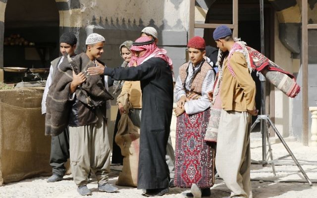 Syrian actors are seen on the filming set of television series 'Tawq al-Banat' in the village of Yaafur, some 20kilometres (12 miles) west of Damascus on May 14, 2017. (AFP/Louai Beshara)