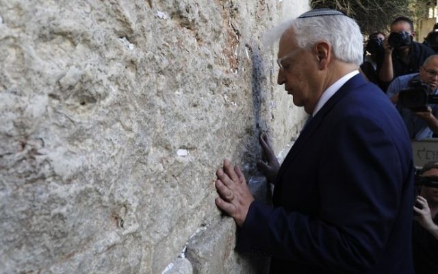 New US ambassador to Israel David Friedman prays at the Western Wall in the Old City of Jerusalem on May 15, 2017. (AFP Photo/Menahem Kahana) New US ambassador to Israel David Friedman prays at the Western Wall in the Old City of Jerusalem on May 15, 2017. (AFP Photo/Menahem Kahana)