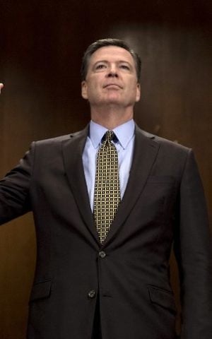 Then-FBI Director James Comey sworn in prior to testifying before the Senate Judiciary Committee on Capitol Hill in Washington, DC, May 3, 2017. (AFP/JIM WATSON)