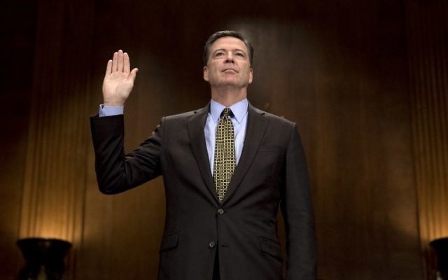 Then-FBI Director James Comey sworn in prior to testifying before the Senate Judiciary Committee on Capitol Hill in Washington, DC, May 3, 2017. (AFP/JIM WATSON) Then-FBI Director James Comey sworn in prior to testifying before the Senate Judiciary Committee on Capitol Hill in Washington, DC, May 3, 2017. (AFP/JIM WATSON)