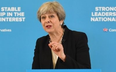Britain's Prime Minister Theresa May speaks during an event in London on May 17, 2017. (AFP Photo/Ben Stansall)