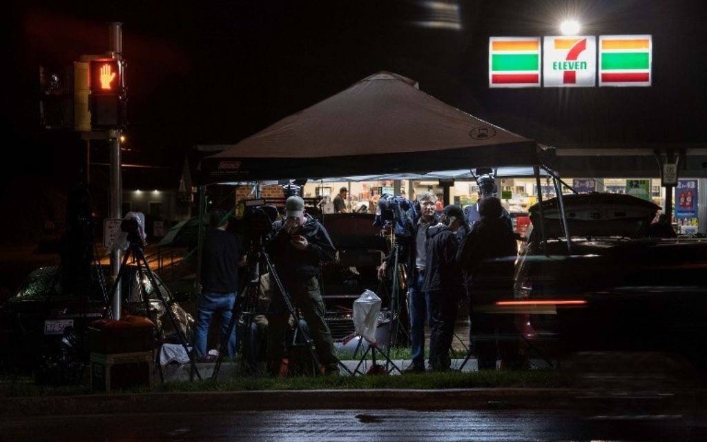 Media crews wait outside US Army facility Fort Leavenworth in Leavenworth, Kansas, before dawn on May 17, 2017.
After seven years behind bars, US Army Private Chelsea Manning will walk out of the security gates of the Fort Leavenworth military prison. (AFP PHOTO / NICHOLAS KAMM)