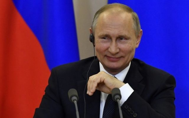 Russian President Vladimir Putin smiles during a joint press conference with Italian Prime Minister Paolo Gentiloni following their meeting at the Bocharov Ruchei state residence in Sochi on May 17, 2017. (AFP Photo/Pool/Yuri Kadobnov) Russian President Vladimir Putin smiles during a joint press conference with Italian Prime Minister Paolo Gentiloni following their meeting at the Bocharov Ruchei state residence in Sochi on May 17, 2017. (AFP Photo/Pool/Yuri Kadobnov)