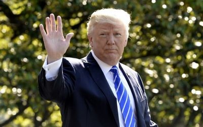 US President Donald Trump waves as he walks towards Marine One while departing the White House on May 17, 2017 in Washington, DC en route to Connecticut. (Olivier Douliery / AFP)