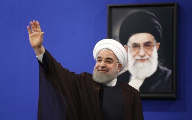 Newly re-elected Iranian President Hassan Rouhani gestures after delivering a televised speech in the capital Tehran on May 20, 2017. (AFP PHOTO / ATTA KENARE) Newly re-elected Iranian President Hassan Rouhani gestures after delivering a televised speech in the capital Tehran on May 20, 2017. (AFP PHOTO / ATTA KENARE)