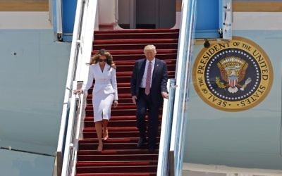 US President Donald Trump and First Lady Melania Trump disembark Air Force One upon their arrival at Ben Gurion International Airport in Tel Aviv on May 22, 2017, as part of his first trip overseas. (AFP PHOTO / Jack GUEZ)