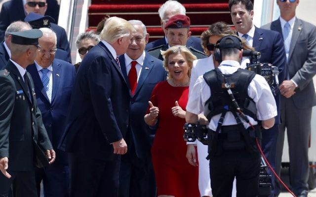 US President Donald Trump (2R) and his wife Melania Trump (R) with Prime Minister Benjamin Netanyahu (2L) and his wife Sara Netanyahu Ben Gurion Airport, May 22, 2017. (Avi Ohayon/GPO)