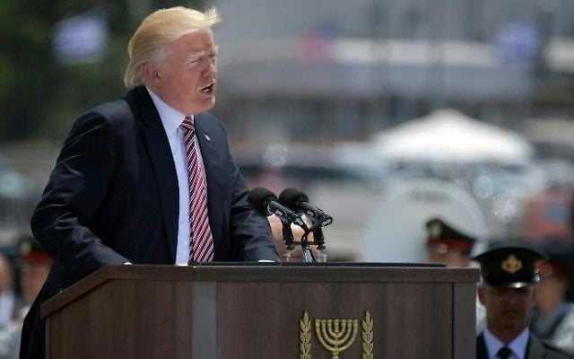 US President Donald Trump (R) gives a speech after arriving at Ben Gurion International Airport on May 22, 2017. (AFP Photo/Mandel Ngan)