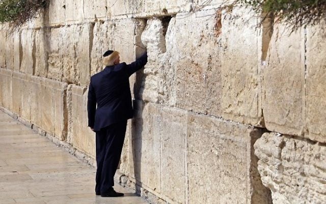 US President Donald Trump visits the Western Wall, the holiest site where Jews can pray, in Jerusalem's Old City on May 22, 2017. (AFP /POOL /RONEN ZVULUN) US President Donald Trump visits the Western Wall, the holiest site where Jews can pray, in Jerusalem's Old City on May 22, 2017. (AFP /POOL /RONEN ZVULUN)