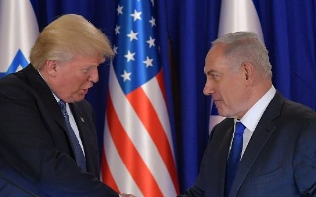 US President Donald Trump (L) and Israel's Prime Minister Benjamin Netanyahu shake hands after delivering press statements, before an official dinner in Jerusalem on May 22, 2017. (AFP PHOTO / MANDEL NGAN) US President Donald Trump (L) and Israel's Prime Minister Benjamin Netanyahu shake hands after delivering press statements, before an official dinner in Jerusalem on May 22, 2017. (AFP PHOTO / MANDEL NGAN)