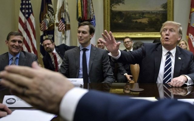 This file photo taken on January 31, 2017 shows then national security adviser General Mike Flynn (L), Senior Advisor Jared Kushner (2L) and US President Donald Trump (R) at the beginning of a meeting on cyber security at the White House. (AFP Photo/Brendan Smialowski) This file photo taken on January 31, 2017 shows then national security adviser General Mike Flynn (L), Senior Advisor Jared Kushner (2L) and US President Donald Trump (R) at the beginning of a meeting on cyber security at the White House. (AFP Photo/Brendan Smialowski)