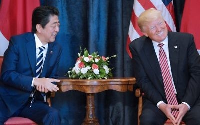 US President Donald Trump (R) takes part in a bilateral meeting with Japan's Prime Minister Shinzo Abe at the Villa Diodoro on the sidelines of the G7 on May 26, 2017 in Taormina, Sicily. (AFP Photo/Mandel Ngan)