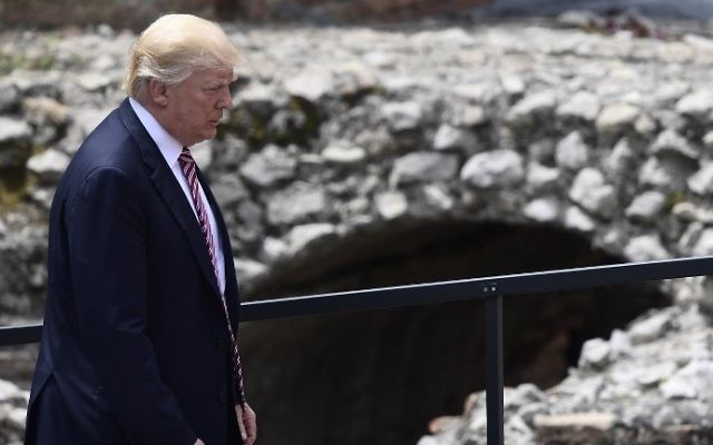 US President Donald Trump arrives for a family photo during the Summit of the Heads of State and of Government of the G7, the group of most industrialized economies, plus the European Union, on May 26, 2017 at the ancient Greek Theater in Taormina, Sicily. (AFP/Miguel Medina) US President Donald Trump arrives for a family photo during the Summit of the Heads of State and of Government of the G7, the group of most industrialized economies, plus the European Union, on May 26, 2017 at the ancient Greek Theater in Taormina, Sicily. (AFP/Miguel Medina)