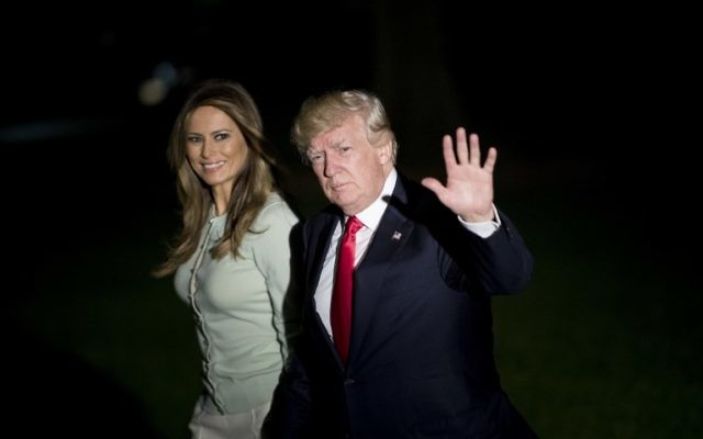 US President Donald Trump, right, and First Lady Melania return to the White House in Washington, DC following his nine-day foreign trip, May 27, 2017. (AFP/Brendan Smialowski) US President Donald Trump, right, and First Lady Melania return to the White House in Washington, DC following his nine-day foreign trip, May 27, 2017. (AFP/Brendan Smialowski)