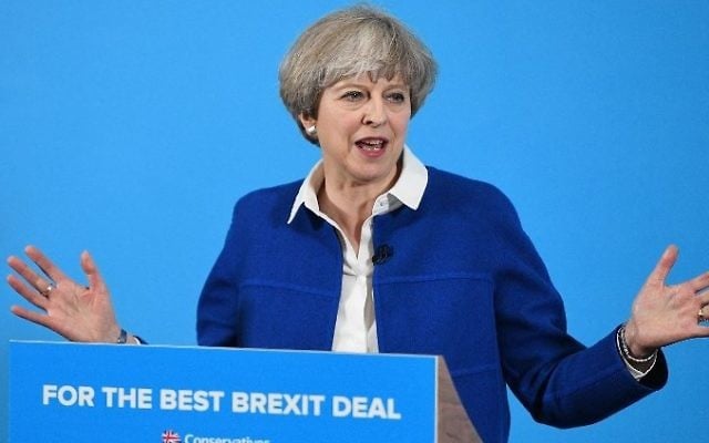 Britain's Prime Minister Theresa May delivers a general election campaign speech in Wolverhampton, central England, on May 30, 2017, as campaigning continues in the build up to the general election on June 8. (AFP/Leon Neal) Britain's Prime Minister Theresa May delivers a general election campaign speech in Wolverhampton, central England, on May 30, 2017, as campaigning continues in the build up to the general election on June 8. (AFP/Leon Neal)