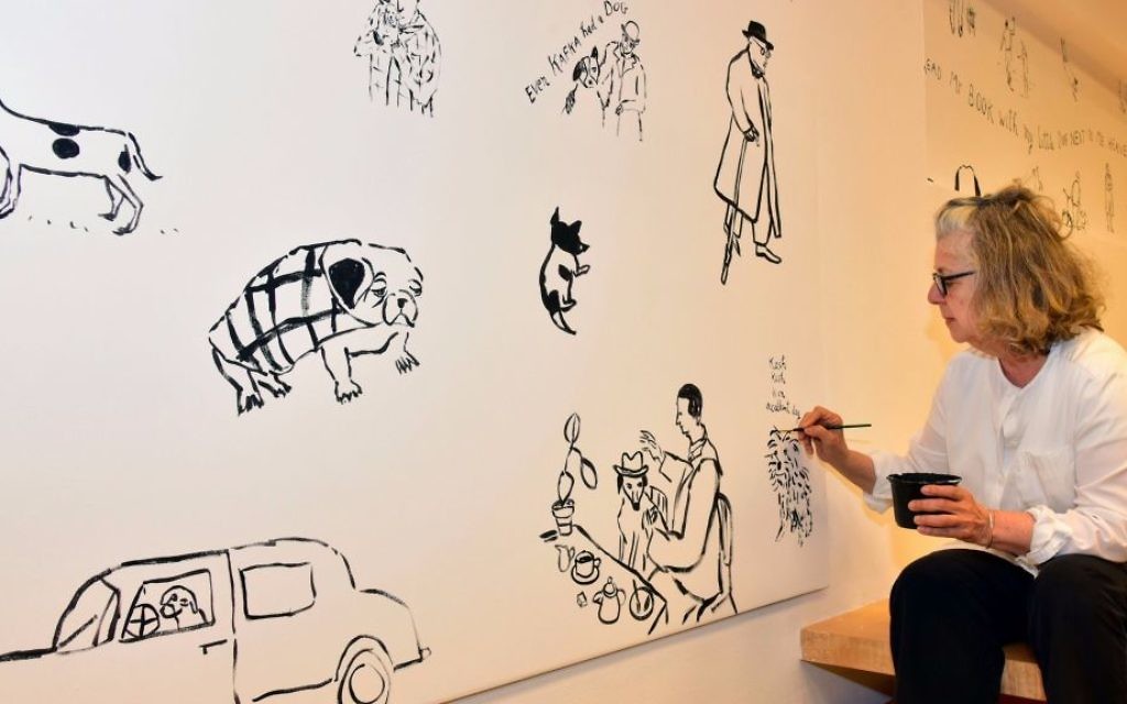 Illustrator Maira Kalman putting the finishing touches on her mural at the Israel Museum's Youth Wing, part of the 'Cats and Dogs' exhibit (Courtesy Benni Maor) Illustrator Maira Kalman putting the finishing touches on her mural at the Israel Museum's Youth Wing, part of the 'Cats and Dogs' exhibit (Courtesy Benni Maor)