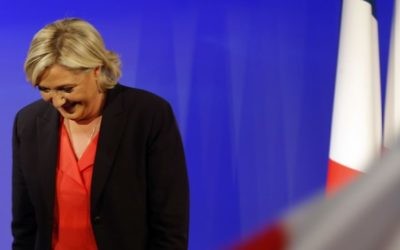 French far-right presidential candidate Marine Le Pen leaves after speaking at her election day headquarters Sunday, May 7, 2017 in Paris. (AP/Michel Euler)