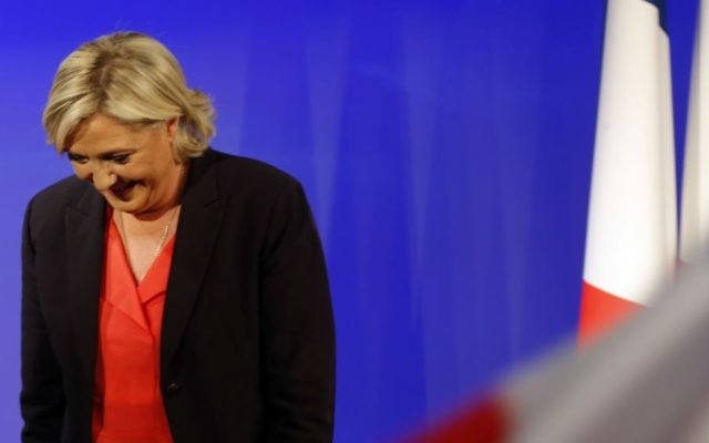French far-right presidential candidate Marine Le Pen leaves after speaking at her election day headquarters Sunday, May 7, 2017 in Paris. (AP/Michel Euler)
