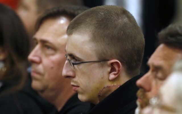 Micah Fletcher, a victim of a stabbing attack on a light rail train that left two dead, watches as suspect Jeremy Christian is arraigned in Multnomah County Circuit Court in Portland, Ore., Tuesday, May 30, 2017. (Beth Nakamura/The Oregonian via AP, Pool) 