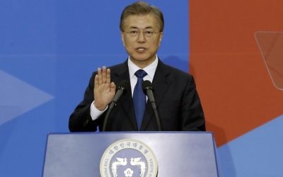 Newly elected South Korean President Moon Jae-in takes an oath during his inauguration ceremony at the National Assembly in Seoul, South Korea, Wednesday, May 10, 2017. (AP/Ahn Young-joon)