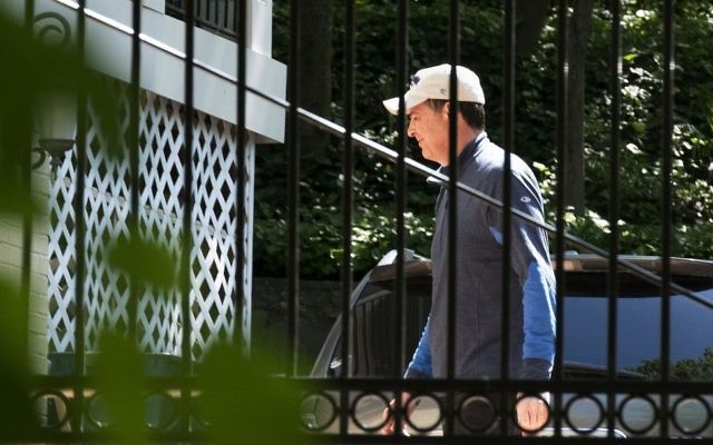 Former FBI Director James Comey walks at his home in McLean, Va., Wednesday, May 10, 2017. President Donald Trump fired Comey on Tuesday, ousting the nation's top law enforcement official in the midst of an investigation into whether Trump's campaign had ties to Russia's election meddling. (AP/Sait Serkan Gurbuz)