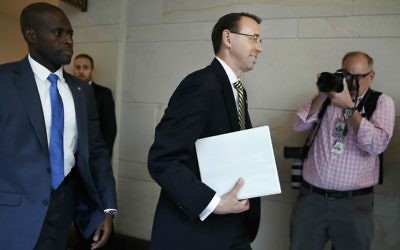 US Deputy Attorney General Rod Rosenstein arrives on Capitol Hill in Washington, Thursday, May 18, 2017, for a closed-door meeting with Senators a day after appointing former FBI director Robert Mueller to oversee the investigation into possible ties between Russia and US President Donald Trump's campaign. (AP Photo/Jacquelyn Martin)
