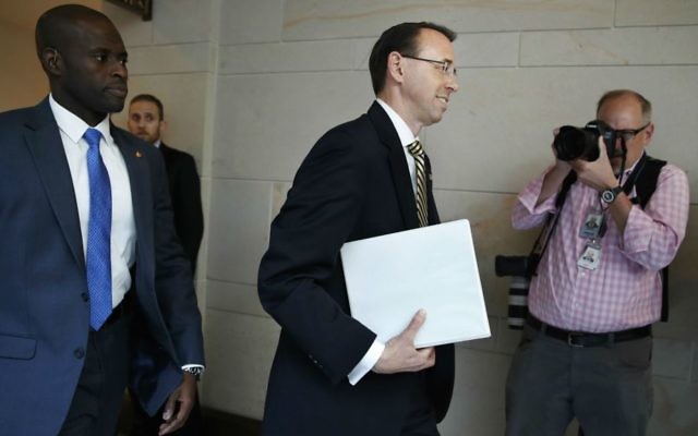 US Deputy Attorney General Rod Rosenstein arrives on Capitol Hill in Washington, Thursday, May 18, 2017, for a closed-door meeting with Senators a day after appointing former FBI director Robert Mueller to oversee the investigation into possible ties between Russia and US President Donald Trump's campaign. (AP Photo/Jacquelyn Martin)