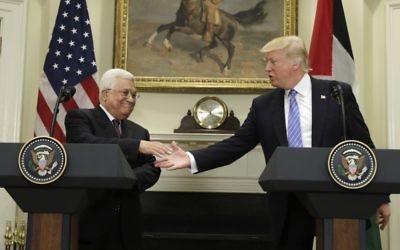 President Donald Trump shakes hands with Palestinian leader Mahmoud Abbas during their news conference in the Roosevelt Room of the White House, Wednesday, May 3, 2017, in Washington. (AP Photo/Evan Vucci)