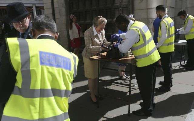 People have their bags searched outside St Paul's Cathedral in London, May 24, 2017 (AP/Tim Ireland) 