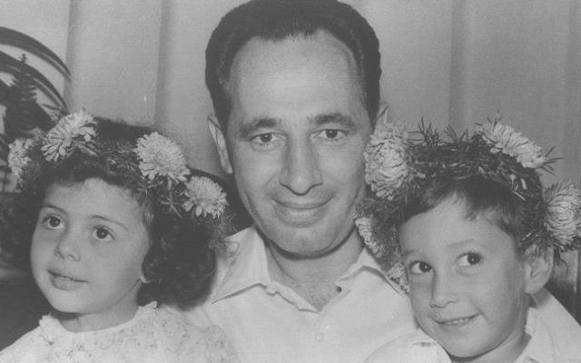 Shimon Peres, center, and Chemi Peres, right, celebrating Chemi's birthday in 1962 (Courtesy: GPO)